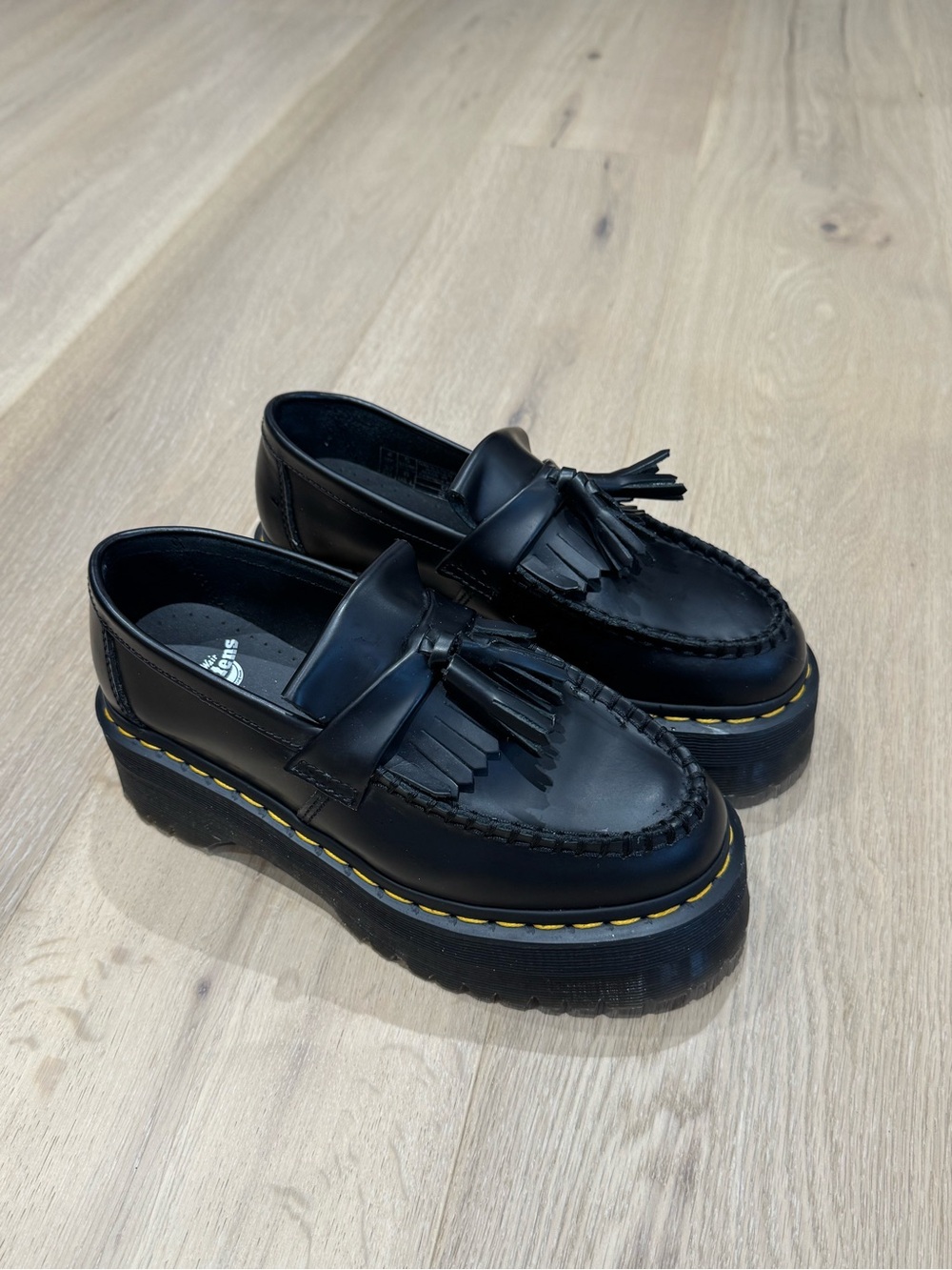Dr. Martens Black Tassel Platform Loafers with Yellow Stitching